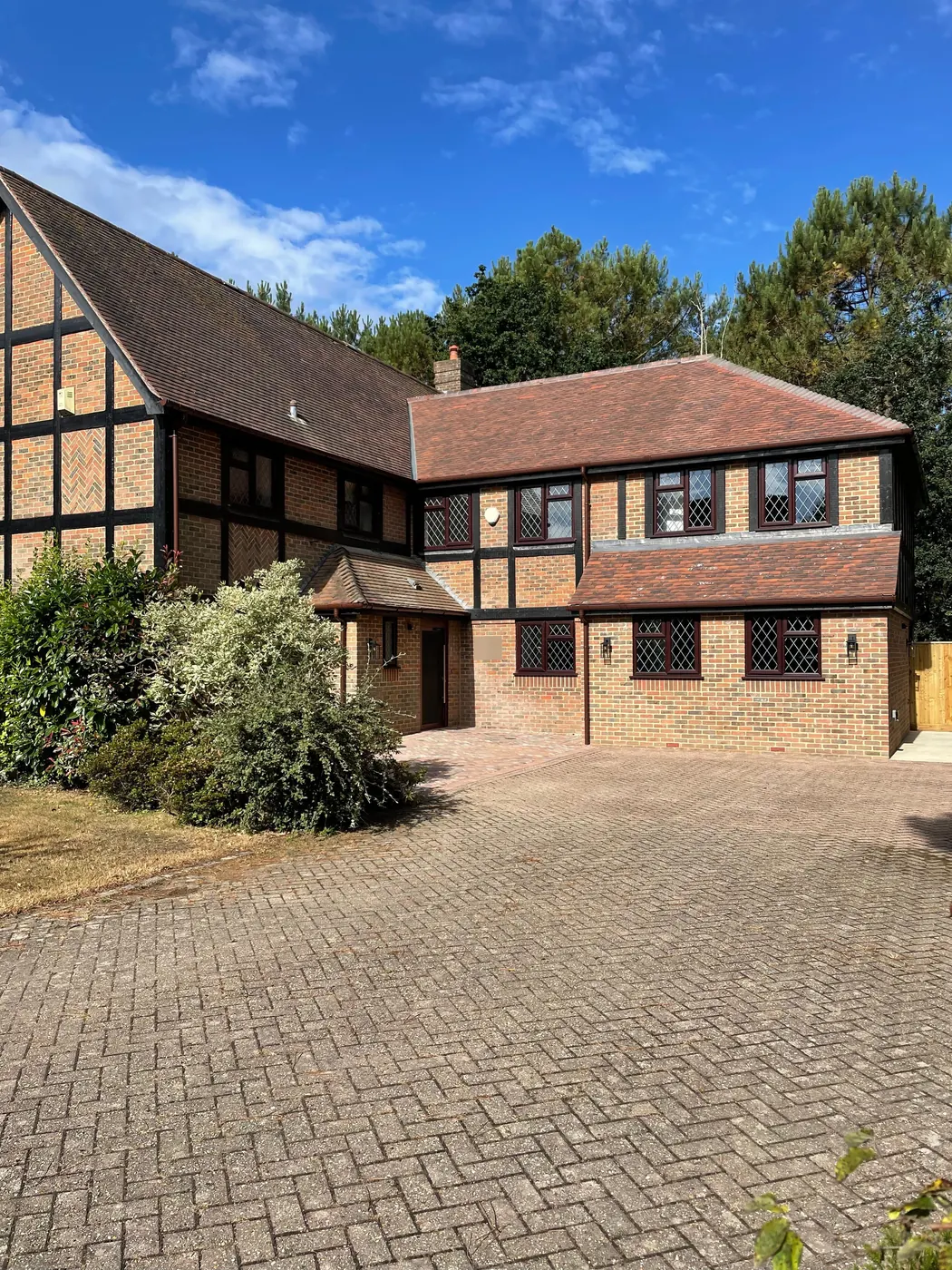 The finished house, with the new two storey extension on the right and a block paved drive